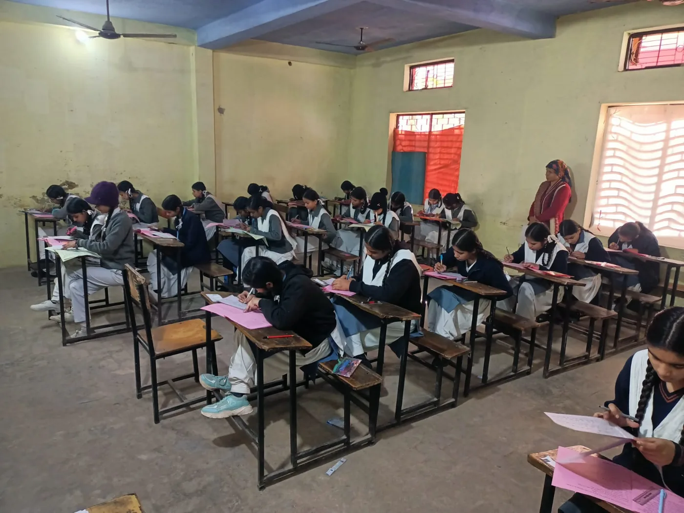 Students appearing for an examination in the classroom